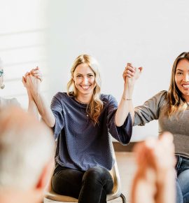 group-of-diverse-people-holding-hands-up-in-the-ai-MAJ7XT5-1.jpg